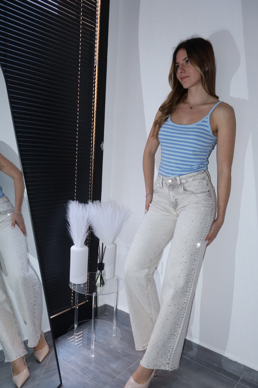 Jeans sabbiati brillantinati