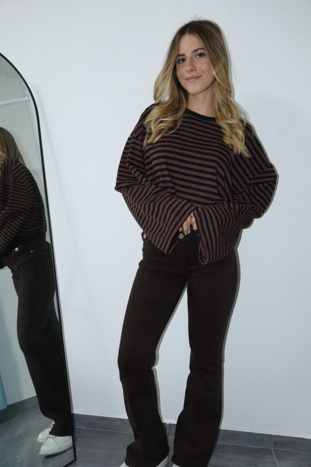 Jeans push up marrone zampa “iconic”